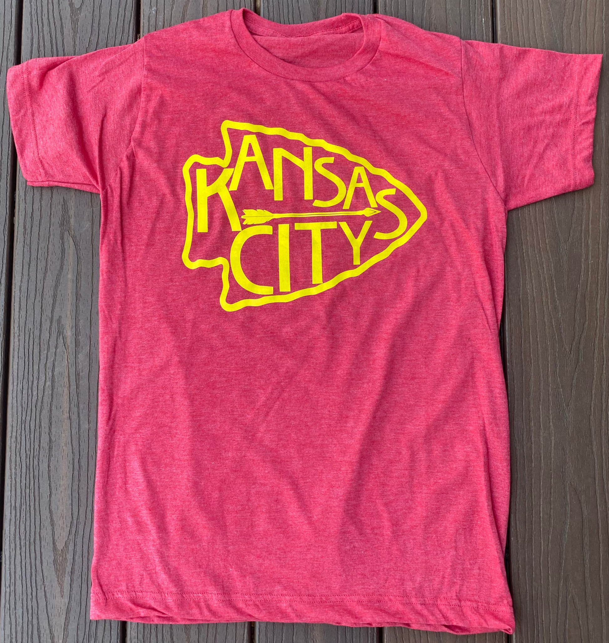 heather red t-shirt with yellow Kansas City Chiefs arrowhead logo with arrow