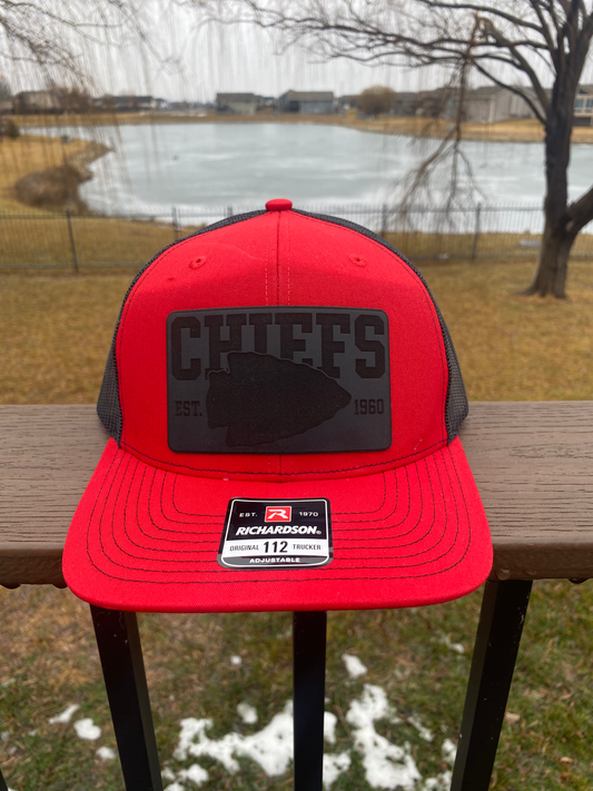 Kansas City Chiefs Leather Patch Hat with arrowhead logo. Established in 1960. Red and black hat. Black on black patch.